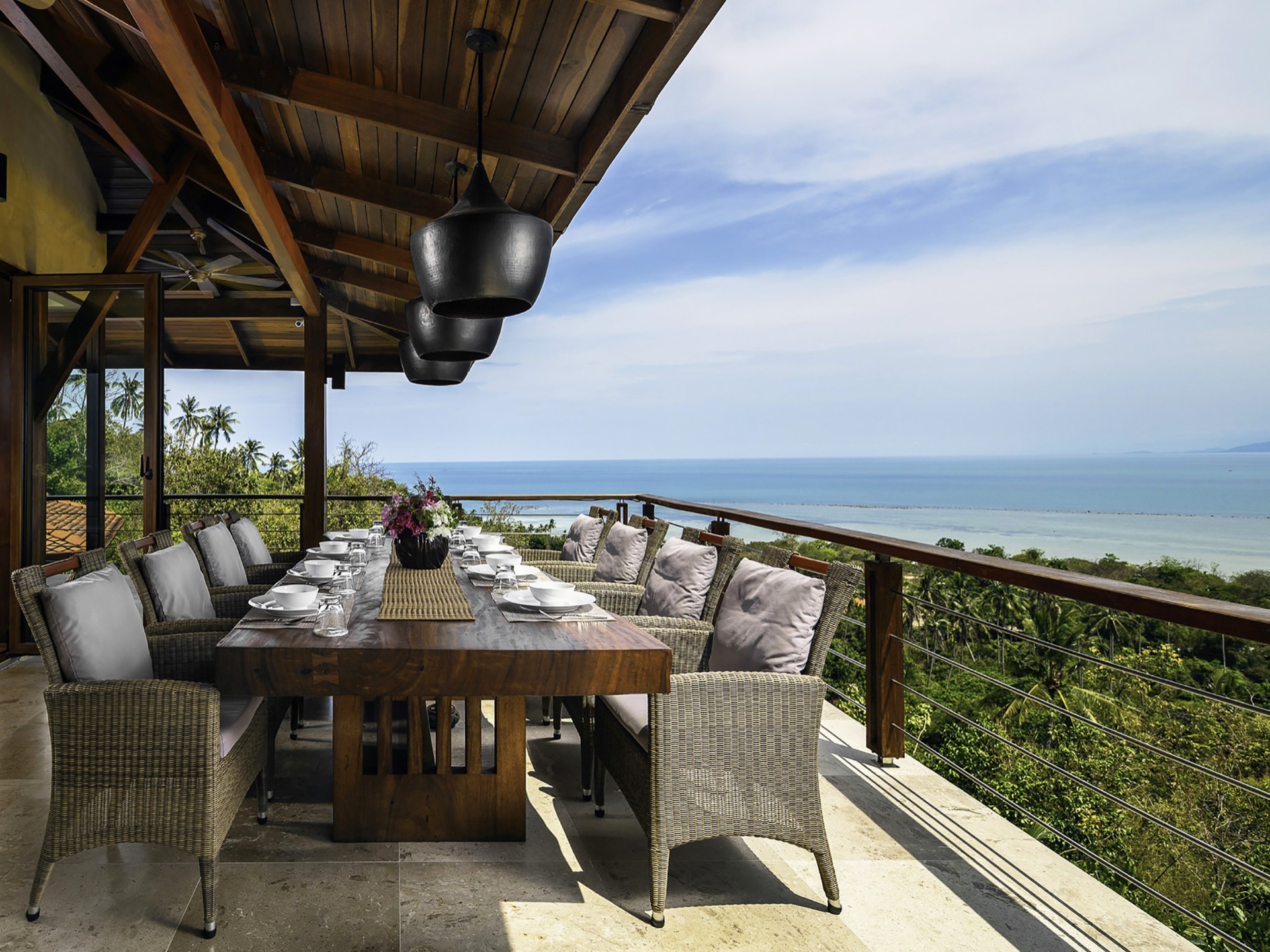 Outdoor dining deck overlooking Koh Samui coastline