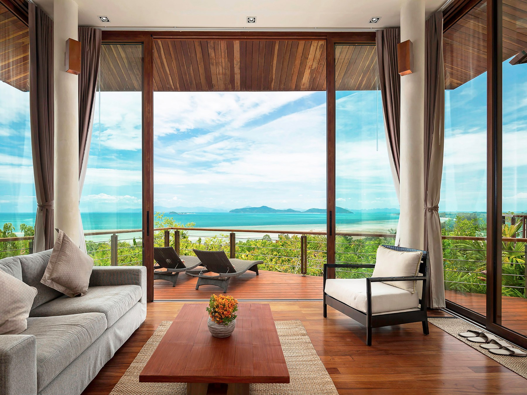 Master villa living room with panoramic coastal views