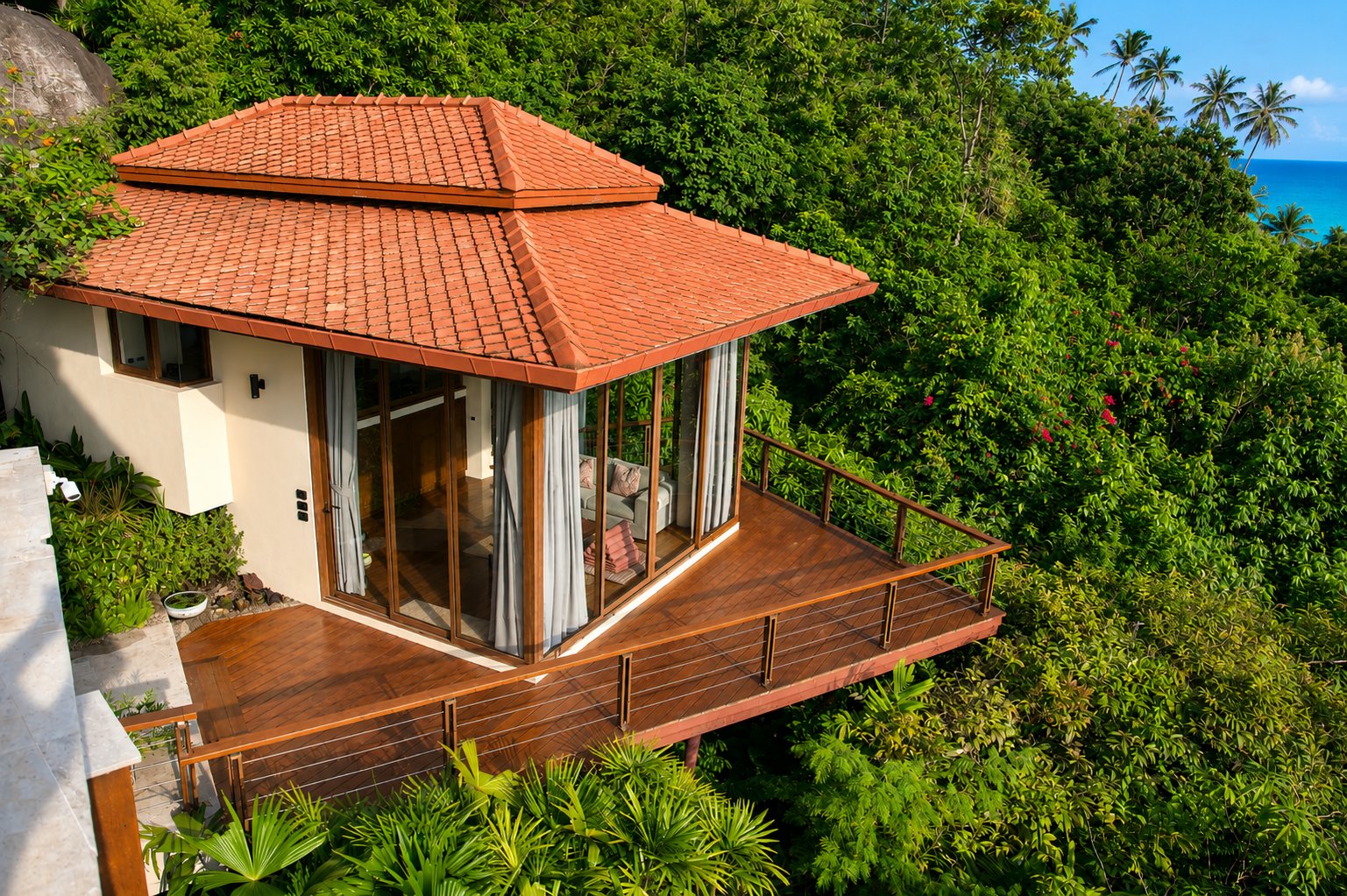 Standalone ocean view villa perched on the hillside with private deck